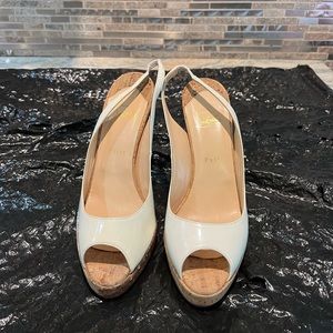 Christian Loubouton white sandals